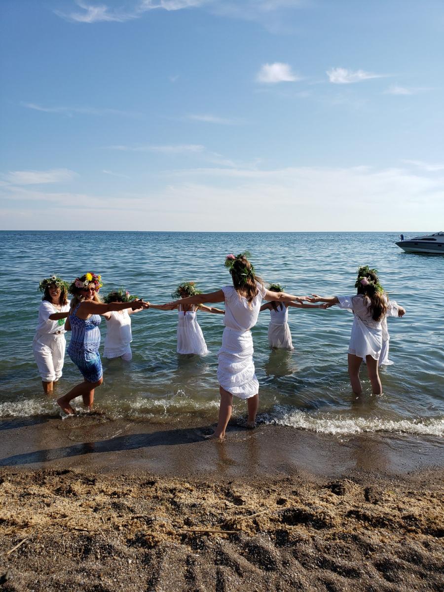 Folk Dancing by the Water